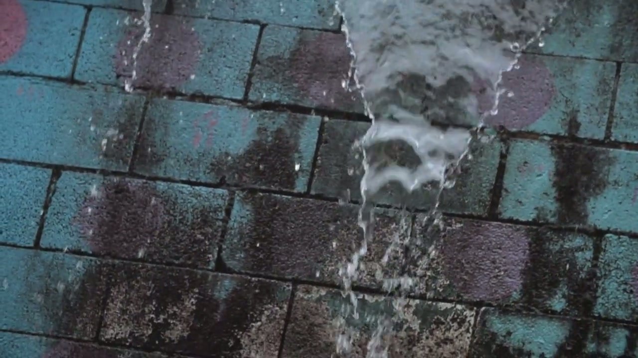 Rain at a residential roof gutter